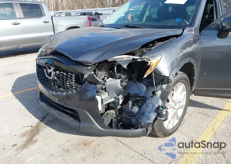 2015 Mazda Cx-5 Grand Touring z USA, uszkodzony, nr VIN JM3KE4DY8F0490897